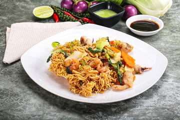 Asian cuisine - Fried noodles with seafood