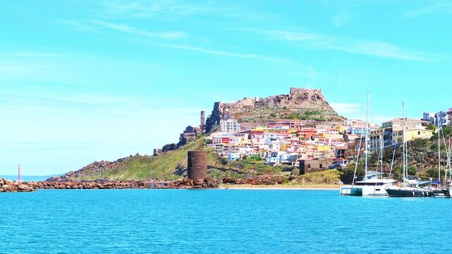 Castle of Serravalle in medieval Bosa town of Italy by boat marina harbor port with colorful buildings architecture cityscape in Sardinia