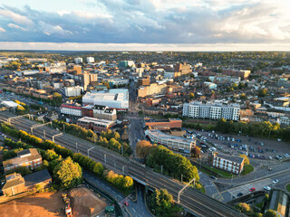 Fototapeta premium High Angle View of Luton City Residential District Which is Located Near to City Center Downtown of England UK During Cold Sunset of October 12th, 2024