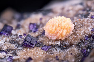 Peach colored baryte ball with purple Fluorite on Quartz. Specimen from Dirtlow Rake, Castleton,...