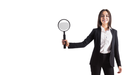 Woman holding magnifying glass, formal attire, white background, concept of analysis
