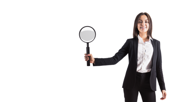 Woman holding magnifying glass, formal attire, white background, concept of analysis