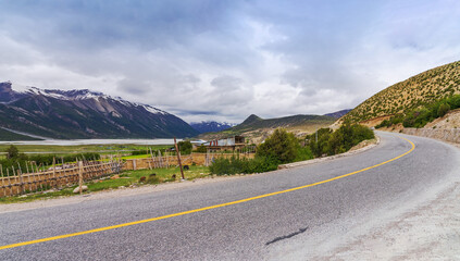 Snow Mountains, Tar Roads and Plateau Lakes in Xizang, China