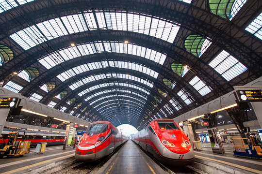 Trenitalia Frecciarossa (Red Arrow) ETR 500 and ETR 1000 high speed express trains at platform of Milano Centrale Station in MILAN, ITALY on JAN 31, 2017