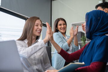 Fototapeta premium business people working as a good team in the office. Successful teamwork in a meeting, workplace concept.