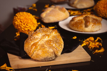Pan de Muerto. Typical Mexican sweet bread that is consumed in the season of the day of the dead. It is a main element in the altars and offerings in the festivity of the day of the dead.