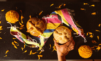 Pan de Muerto. Typical Mexican sweet bread that is consumed in the season of the day of the dead. It is a main element in the altars and offerings in the festivity of the day of the dead.