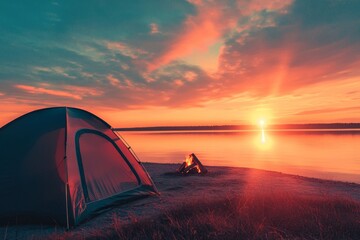 Campsite at sunset with a tent and a campfire.