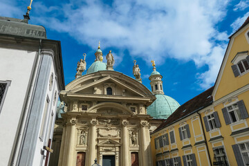 Close-up view of a grand cathedral dome of Mausoleum of Emperor Ferdinand II in Graz, Styria, Austria, Europe. Intricate sculptures and architectural details. Statues stand atop of Graz cathedral