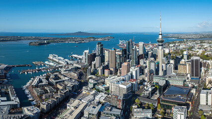 Aerial: Panoramic view of Auckland city skyline at sunset, New Zealand