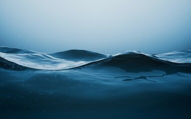 Ocean waves. Tranquil blue water with gentle waves. The image evokes a sense of serenity and peace.
