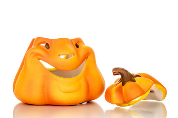 One ceramic Halloween figurine, macro, isolated on white background.