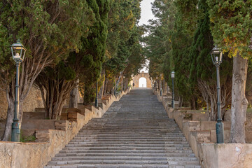 General view of the Calvary stairs leading up to the hermitage of Sant Salvador in the Majorcan town of Arta, at dawn. Spain