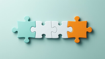 Four interlocking puzzle pieces in different colors arranged in a row on a pastel background, symbolizing connection and teamwork