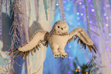 New Year's decorations, toys and garlands in fabulous settings. Toy animals for children in a public place.