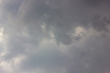 Stormy clouds background. Dark grey sky before the rain