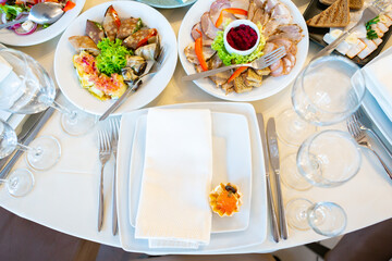 Elegant Dining Setup Featuring an Array of Gourmet Dishes at a Festive Celebration