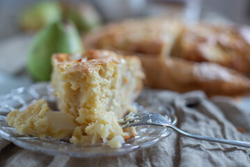 French pear tart or pie with fresh pear fruits