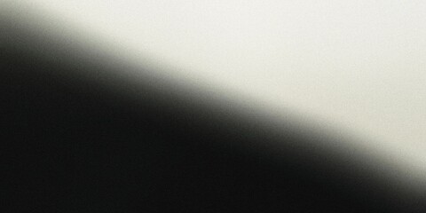 Fototapeta premium Gradient background with dark black and soft cream tones, featuring gentle radial gradients and a light, ethereal blur , noise texture effect