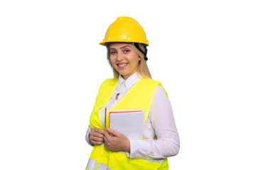 Energetic young woman engineer in a hard hat on-site