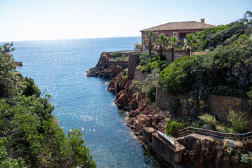 Views along Corniche d’Or or Corniche de l’Esterel beautiful coastal road, crystalline blue sea...