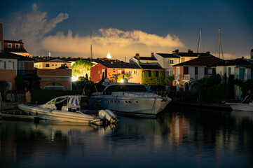 Fototapeta premium Travel and summer vacation destination, night view on houses, roofs, canals and boats in Port Grimaud, Var, Provence, French Riviera, France