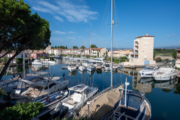 Travel and summer vacation destination, view on houses, roofs, canals and boats in Port Grimaud, Var, Provence, French Riviera, France