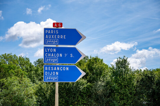 Driving in summer on road, road signs direction to Dijon, Paris, Lyon and other French cities, different types or roads in France, transportation and traffic