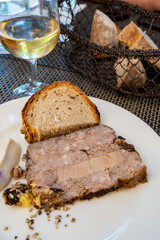 Terrine foie gras fat liver specialty food product made of liver of a duck or goose fattened by force feeding, served in French restaurant in Perigoed, Dordogne, close up