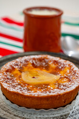 Basques food, sheep’s milk curd dessert Mamia or Cuajada, Curd, maman, gatzatua or gaztanbera Original Basque Dessert curdled with rennet and homemade pears cake