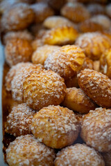 Chouquettes or petits choux are small pieces of French patisserie consisting of small spheres of choux pastry, sugared and baked, Bordeaux, France