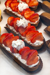 French cuisine, fresh baked iced strawberry cake with chantilly cream, sweet dessert