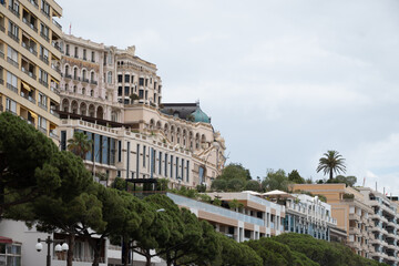 Fototapeta premium Walking in Monte-Carlo city in Monaco principality, houses and streets, touristic destination on Mediterranean Sea in summer