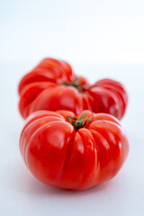 Sweet tasty ripe red french tomatoes from Brittany, France, salad seasonal vegetables