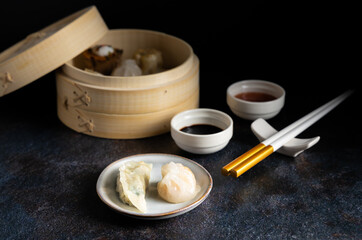 Dim sum steamed in a bamboo basket.