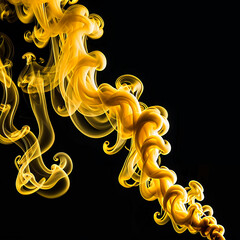 Yellow smoke on black background