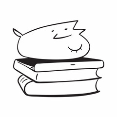 cat sleeping on a stack of books