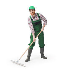 Smiling farmer using a rake