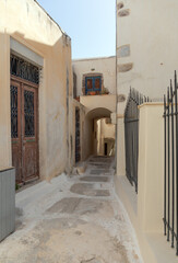 Narrow alley in the Venetian castle of Emporio, Santorini island, Greece