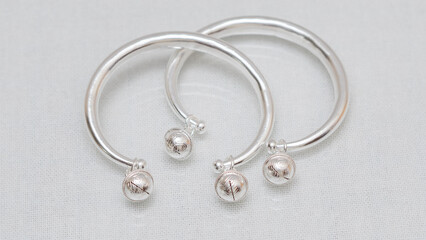 Hmong or Miao handmade silver jewelry on white background