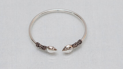 Hmong or Miao handmade silver jewelry on white background