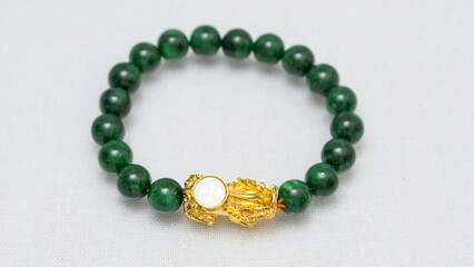 Natural gemstone bracelet display on white bqackground