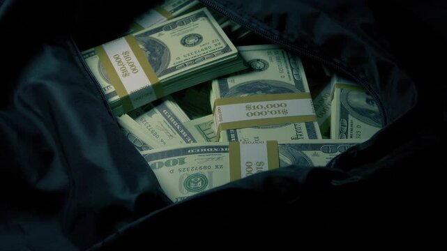 Bag Of Money Is Zipped Up And Taken
