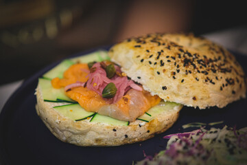 Salmon sandwich in the plate.