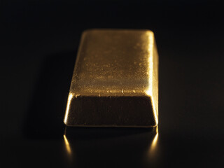 a gold bar on black background