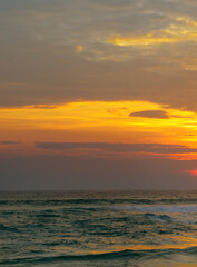 Fototapeta premium Sea and bright sunrise. Concept - vacation and travel.