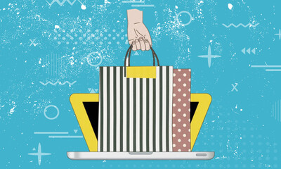 Hand holding striped shopping bag emerges from an open laptop, symbolizing online shopping.