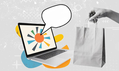 A laptop with a colorful wheel on screen and speech bubble, next to a hand holding a paper bag.