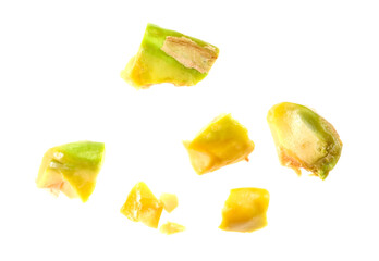 Pieces of peeled pistachio nut isolated on white