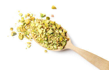 Pieces of peeled pistachio nut in wooden spoon isolated on white